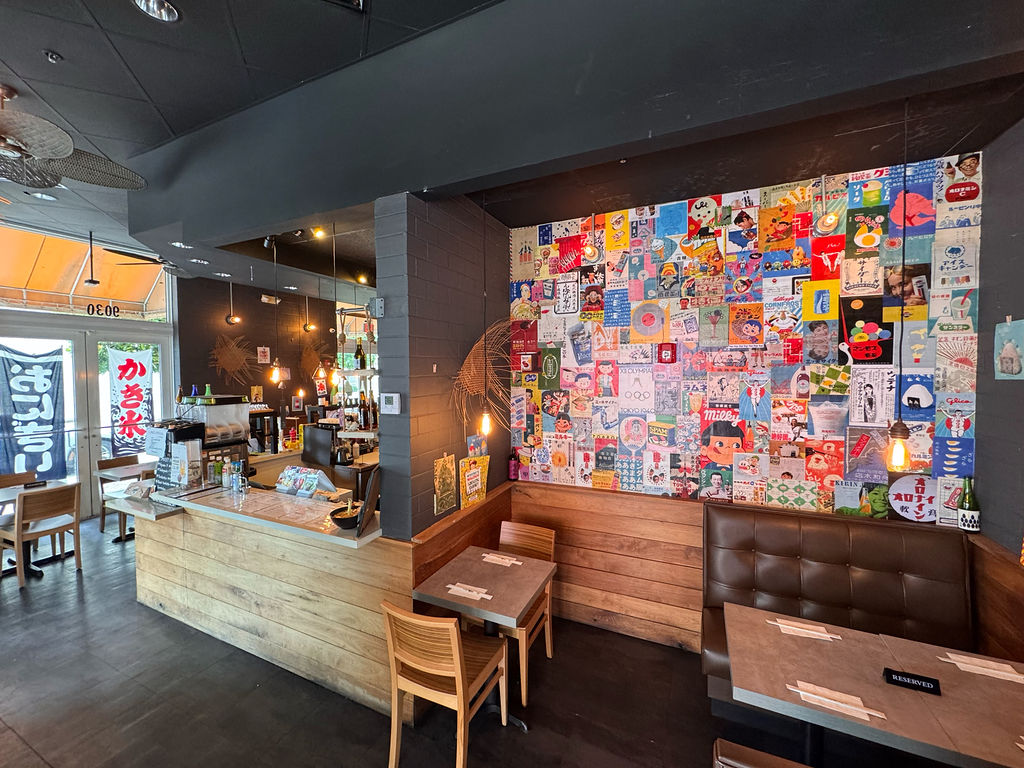 Umaimon restaurant ambiance with Japanese artwork and decor